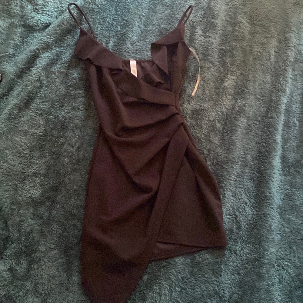 black mini dress. Asymmetrical.